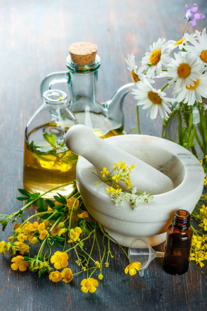 istock Essential oils and wild flowers 810135058