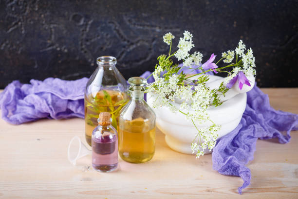 istock Essential oils and wild flowers 810136506