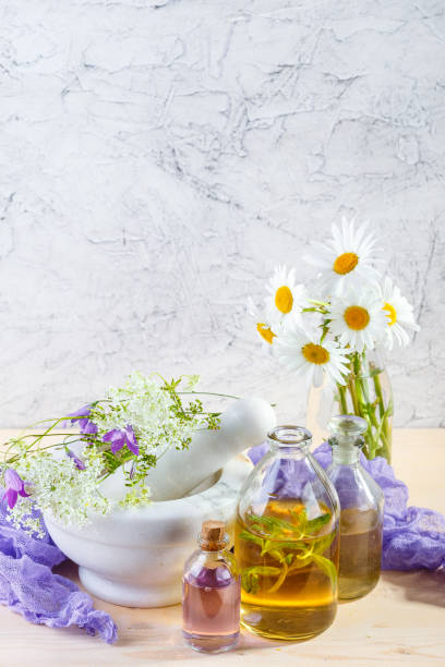 istock Essential oils and wild flowers 810137354