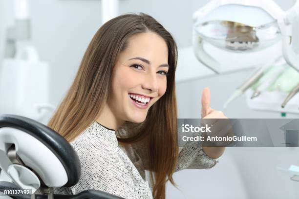 Dentist Patient Satisfied After Treatment Stock Photo - Download Image Now - Dental Equipment, Dentist, Smiling