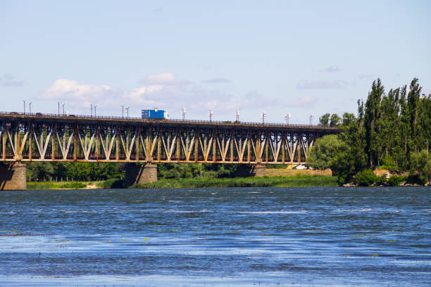 istock Bridge with traffic over the Dnieper river in Kremenchug, Ukraine 810140094