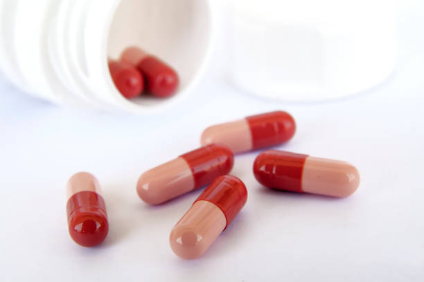 istock Pills in medicine bottle 810150192