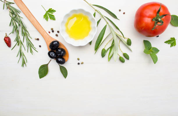 istock Olive oil with cooking ingredients and spices 810155336