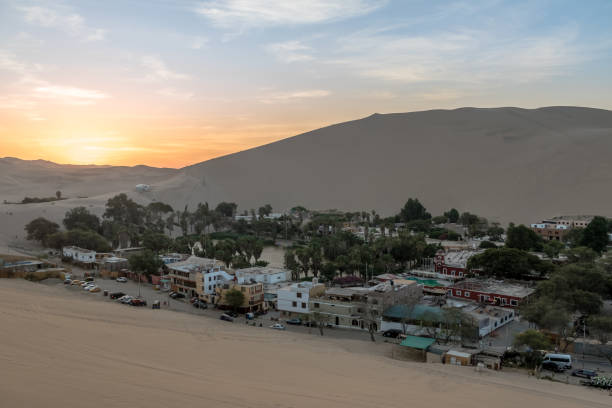istock Huacachina Oasis at sunset - Ica, Peru 810158562