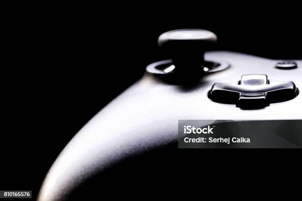 Close Up Studio Shot Of Gamepad On Black Background Stock Photo - Download Image Now