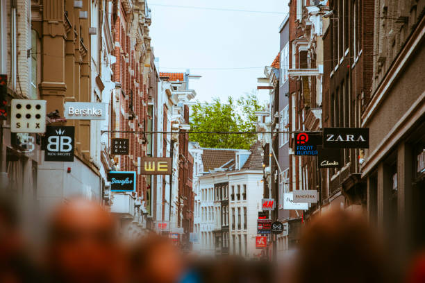 istock Street with stores in Amsterdam 810171730