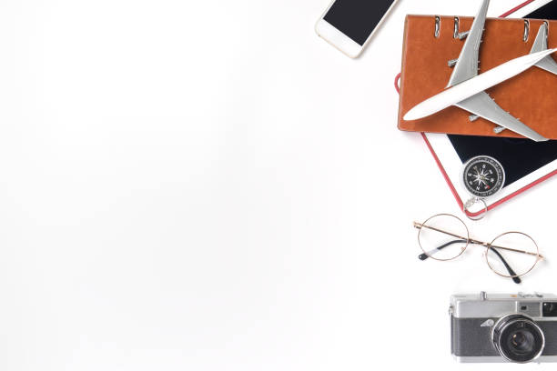 istock World travel accessories and gadgets on white copy space 810171770