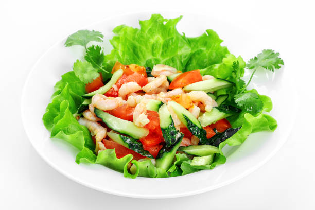 Vegetable salad with shrimp, cucumber, tomatoes, garlic, shrimp