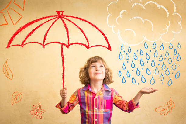 istock Child in autumn 810232846
