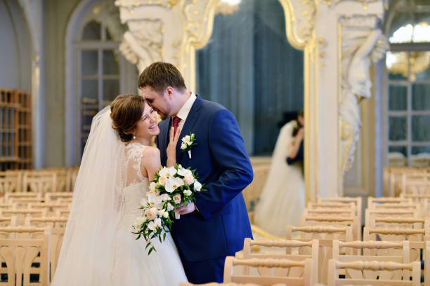 istock Wedding couple indoors is hugging each other 810238150