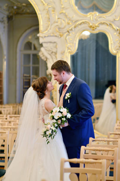 istock Wedding couple indoors is hugging each other 810238212