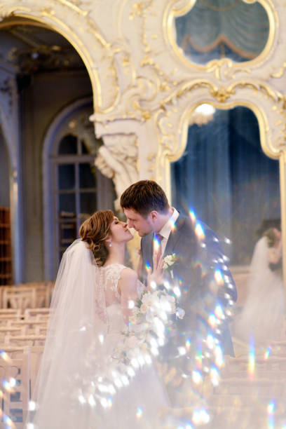 istock Wedding couple indoors is hugging each other 810238338