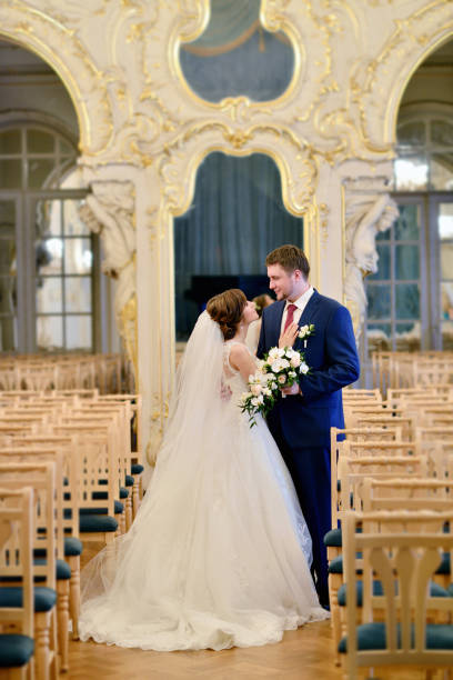 istock Wedding couple indoors is hugging each other 810240674