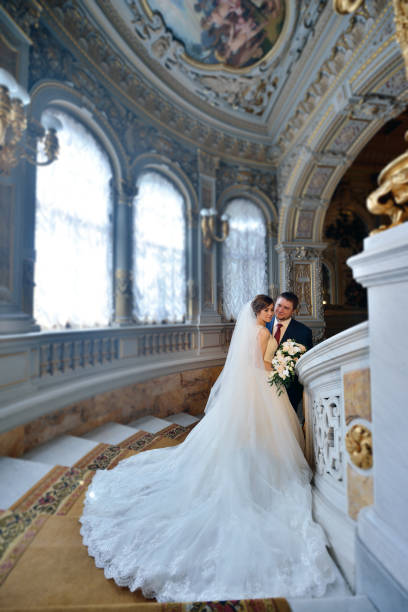 istock Wedding couple indoors is hugging each other 810243154