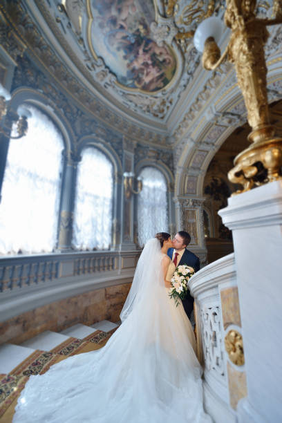istock Wedding couple indoors is hugging each other 810243186