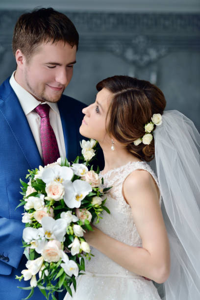 istock Wedding couple indoors is hugging each other 810256066