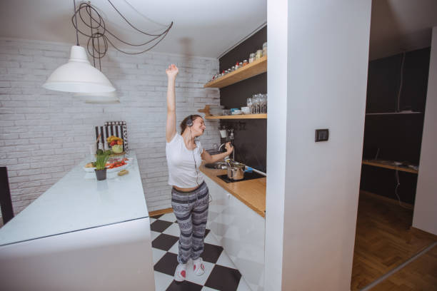 istock Listening music and cooking 810256826