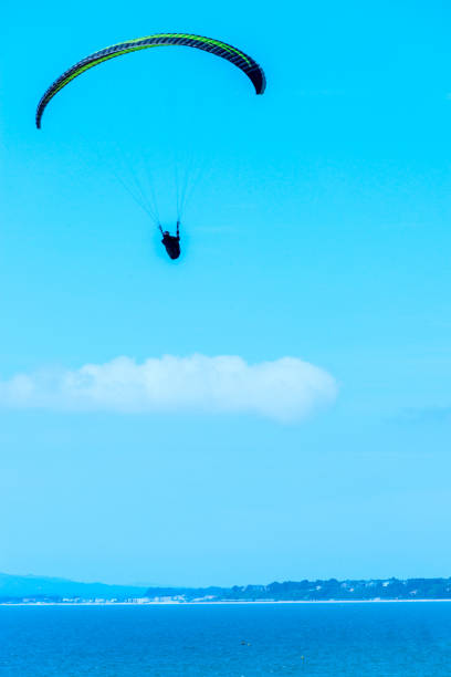 istock Para glider flying in the sky, free time spent actively, wonderful experiences 810260222