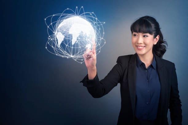 istock Beautiful Business Woman touching technology global communication on virtual screen 810275026