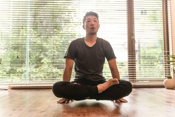 istock Japanese man doing yoga 810275280