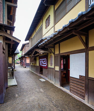 Japanese Edo village narrow street movie set at Toei Studios Kyoto on an overcast day.