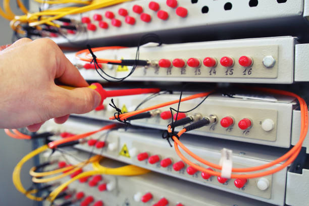istock Optical fibre information technology equipment in data center 810283056