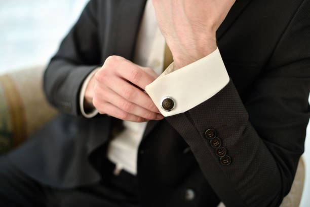 istock Groom is wearing a suit indoors 810290424