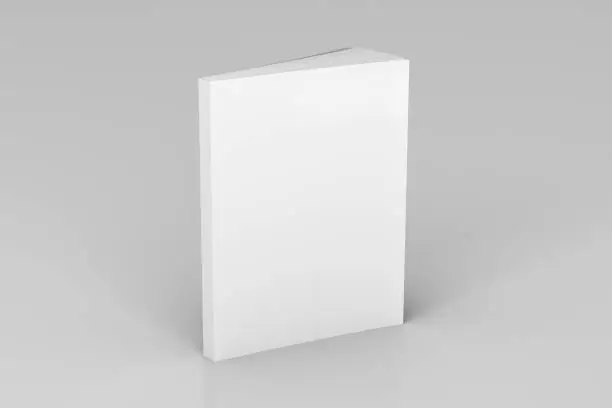 Blank white vertical soft cover book standing on white background. Isolated with clipping path around book. 3d illustration