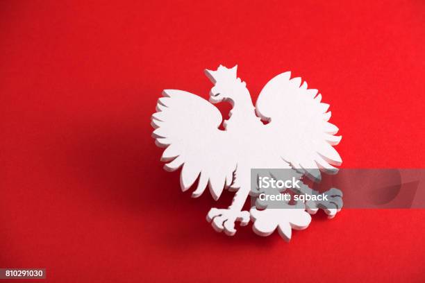 Polish Coat Of Arms On Red Background Stock Photo - Download Image Now - Poland, Patriotism, Coat Of Arms