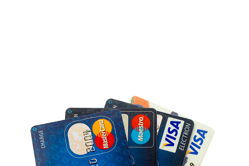 Sarajevo, Bosnia and Herzegovina - January 15, 2017: closeup pile of credit cards, Visa and MasterCard, credit, debit and electronic