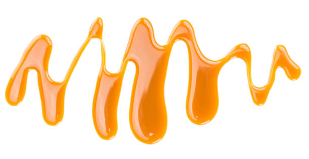 istock Portion of Caramel Sauce on a slate slab 810305940