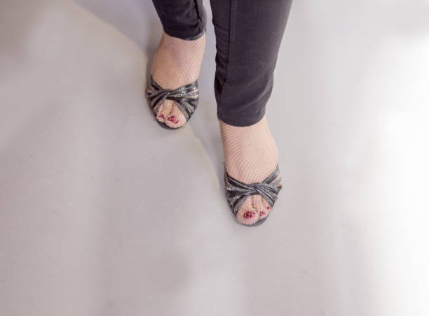 istock Woman dancing with salsa sandals 810317842
