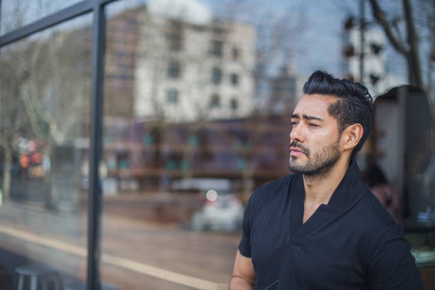 istock Young man standing on the street 810326664