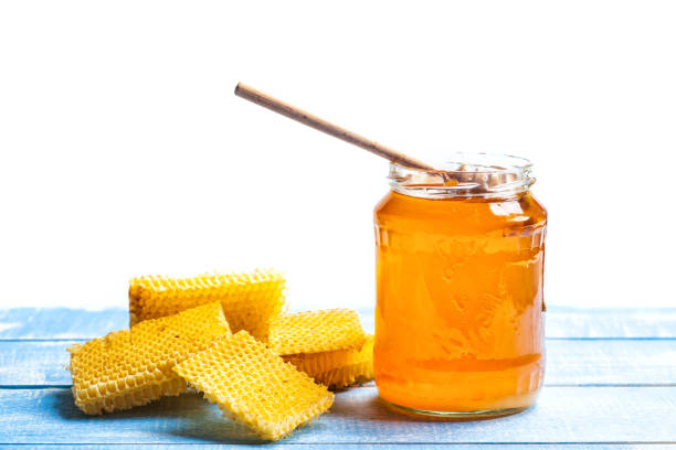 honig und honeycomb - syrup jar sticky isolated objects stock-fotos und bilder