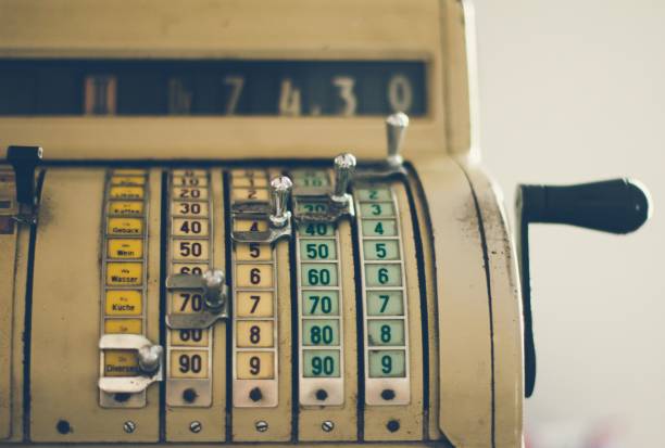 istock Old vintage cash register machine 810348054