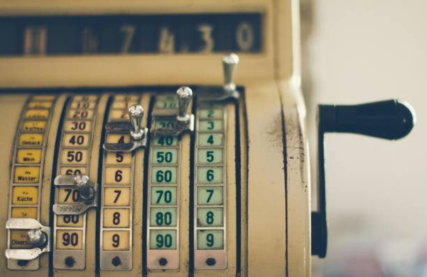 istock Old vintage cash register machine 810348088