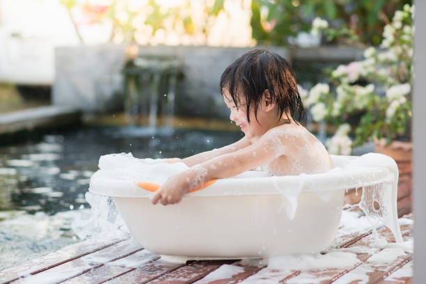 istock Cute asian  child bathing 810382662