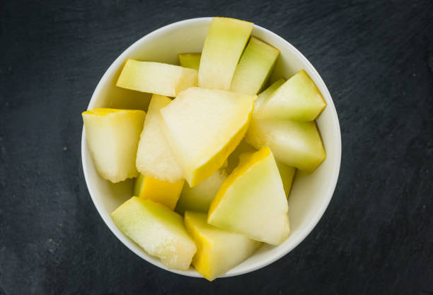 istock Portion of Yellow Honeydew Melon (selective focus) 810394562