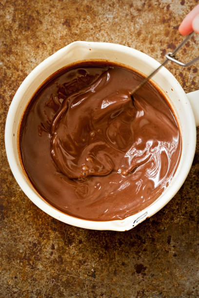 istock Chocolate filling for chocolate pie in pot 810424238