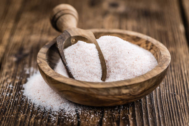 istock Himalayan Salt on wooden background (selective focus) 810426690