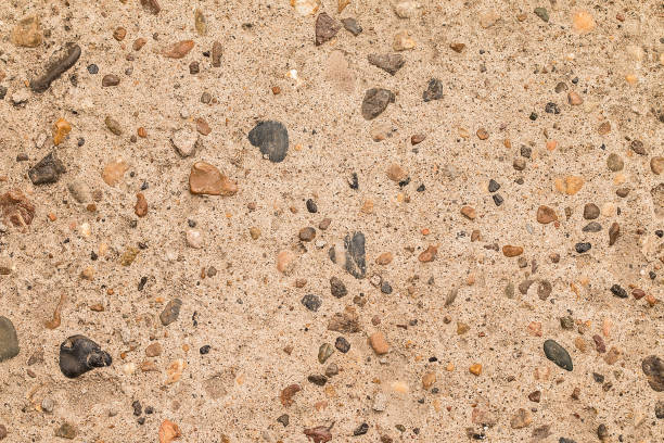istock Gray background. Concrete and colored pebbles 810444462