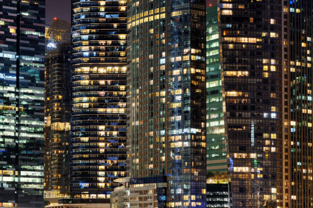 istock Scenic glowing windows of skyscrapers at evening 810455238