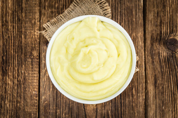 istock Mashed Potatoes (selective focus) on vintage wooden background 810457540