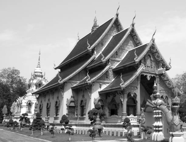 istock beauful thai temple in forest. 810457698