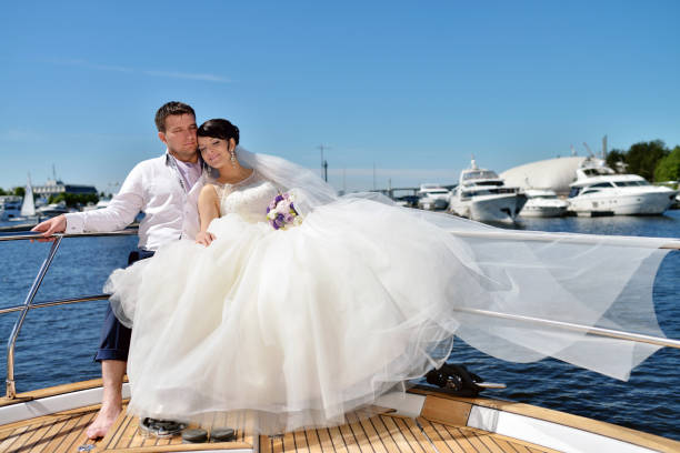 istock Wedding couple is hugging on a yacht 810491690