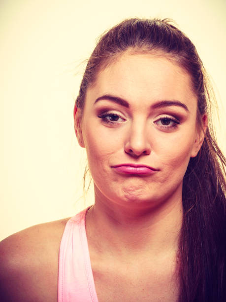 istock Sporty girl making silly faces. 810491846