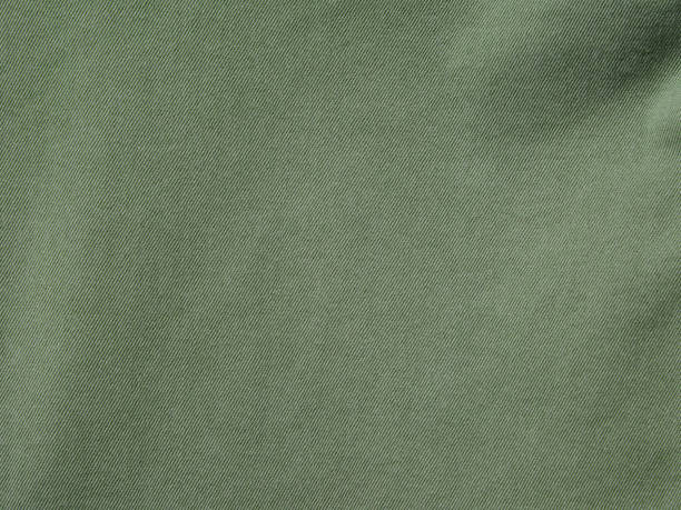 grün khaki denim textil hintergrund - kaki stock-fotos und bilder