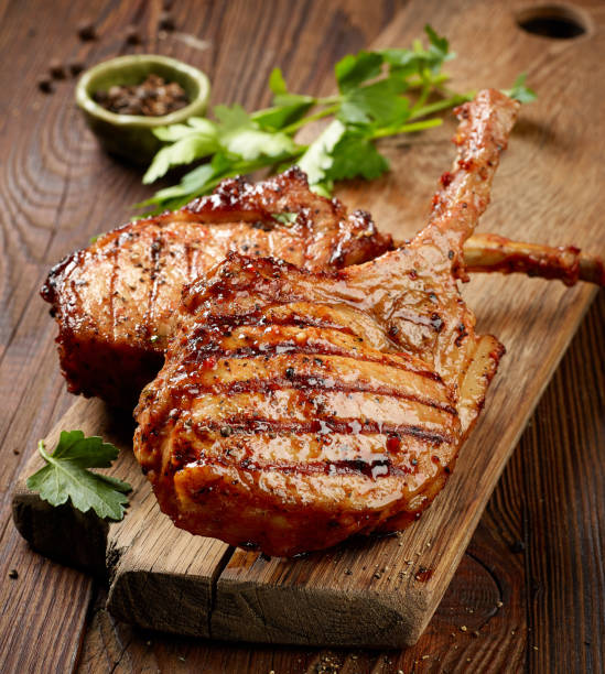 istock freshly grilled steaks on wooden table 810517880