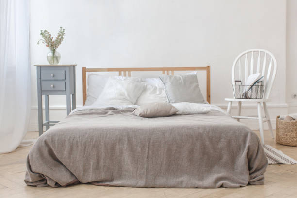 istock Interior of white and gray cozy bedroom 810517962