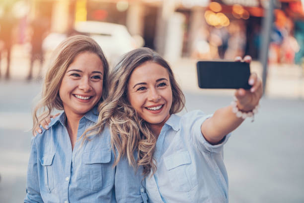 istock Beautiful sisters selfie 810526958